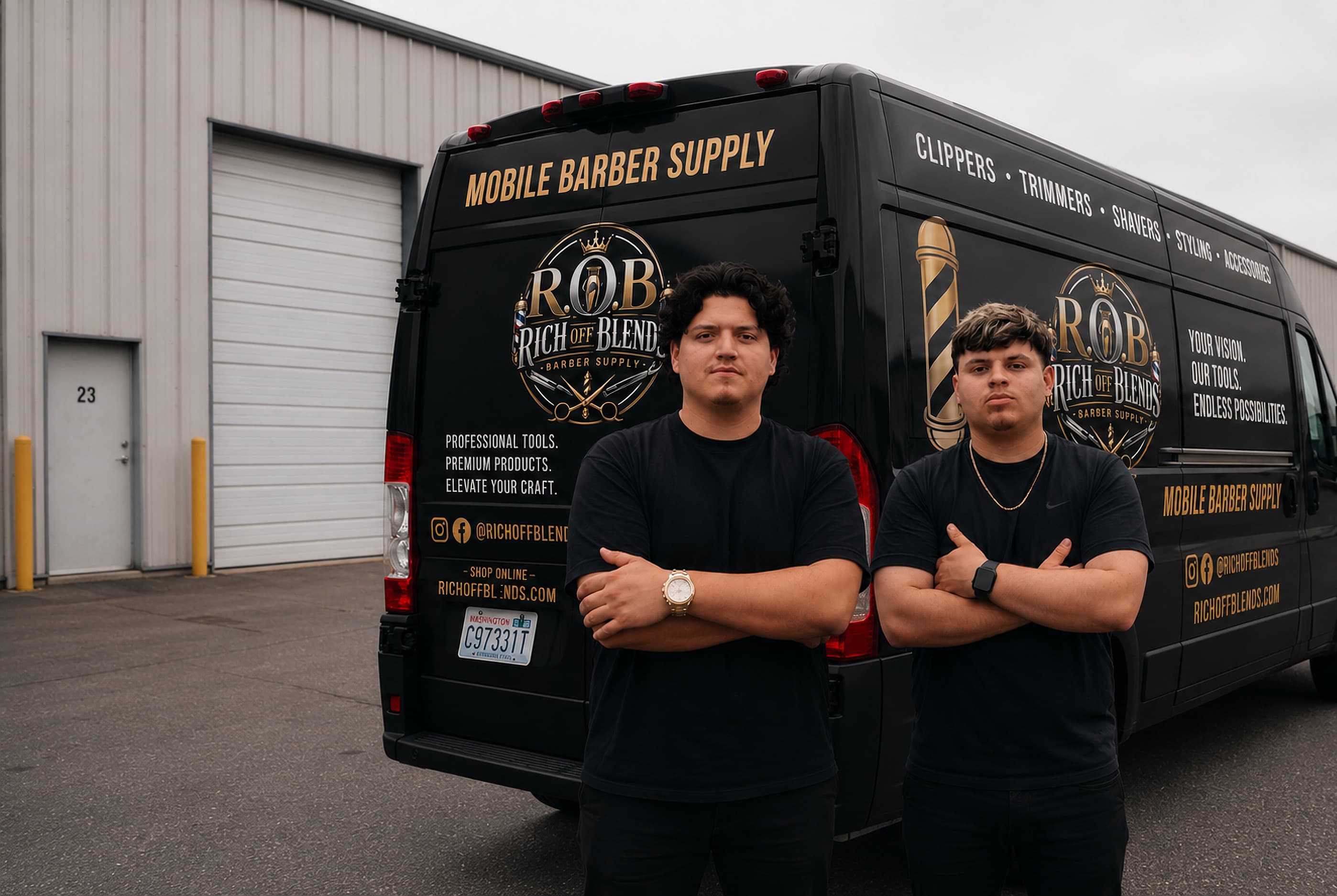 The Rich Off Blends founders standing in front of their mobile barber supply van